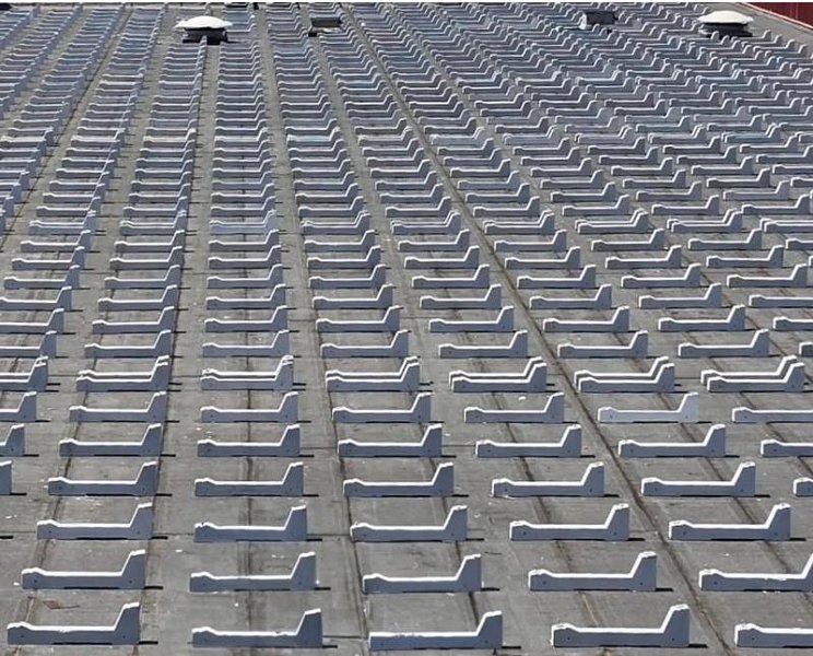 Warum sollten Photovoltaikmodule auf Flachdächern mit Betonblöcken montiert werden?